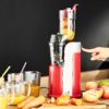 Extracteur de jus Healthy Juicer rouge de profil